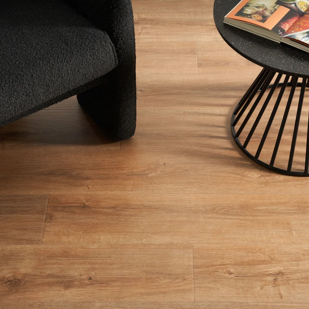 Ribbonwood Oak laminate flooring in a furnished living room